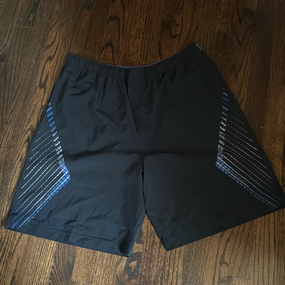 NWOT Men’s Prince Poly/Spandex Black & Blue Tennis shorts. 9” inseam. XL.